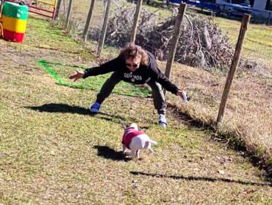 Dog finishes run and races to mom