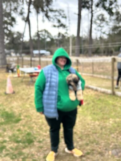 dog park with a man and a dog.