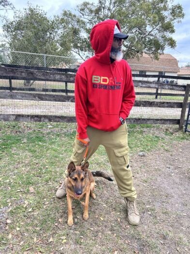 dog park with a man and a dog.